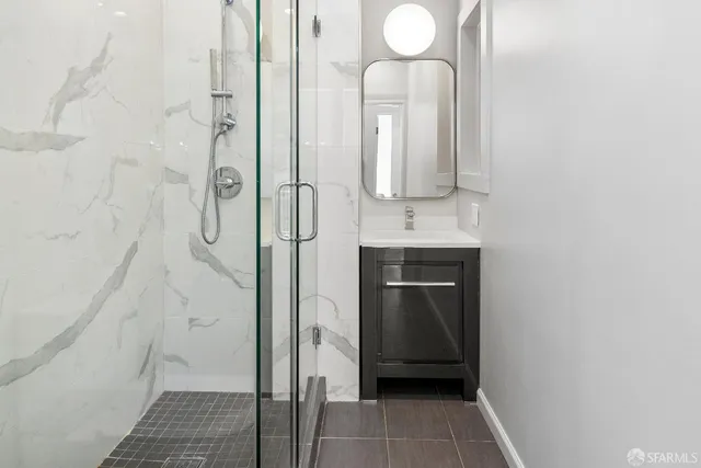 a bathroom with a sink and a mirror