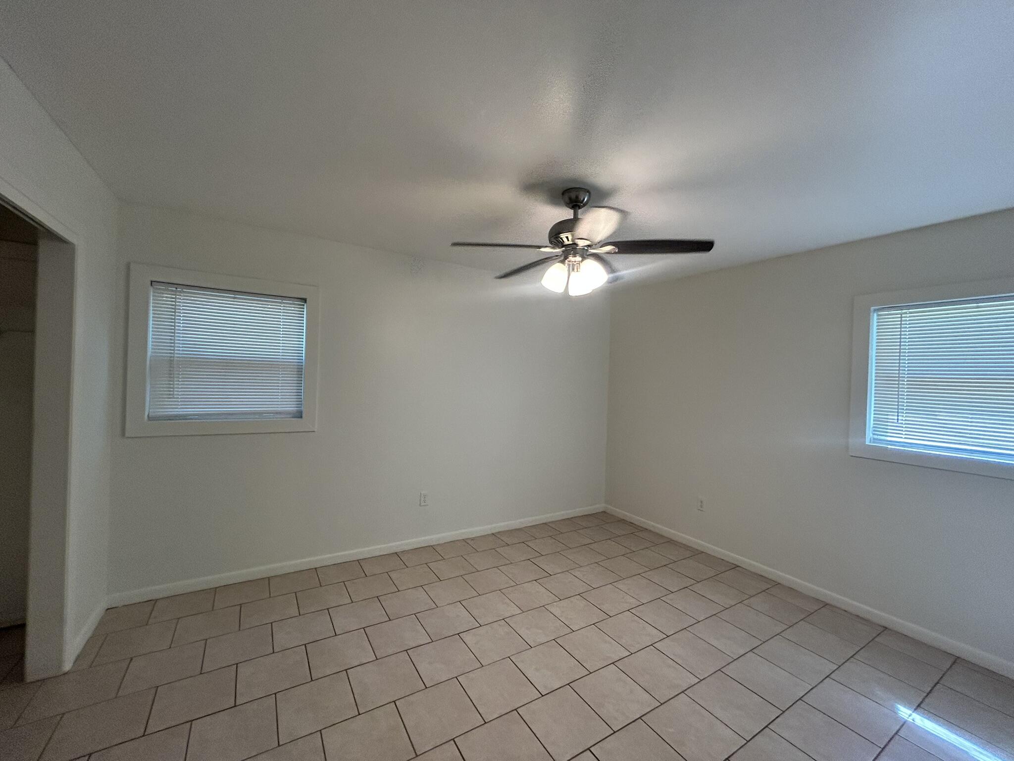 2807 60th Street Lubbock, TX 79413 - Photo 8 of 15 a view of a room that has a window in it