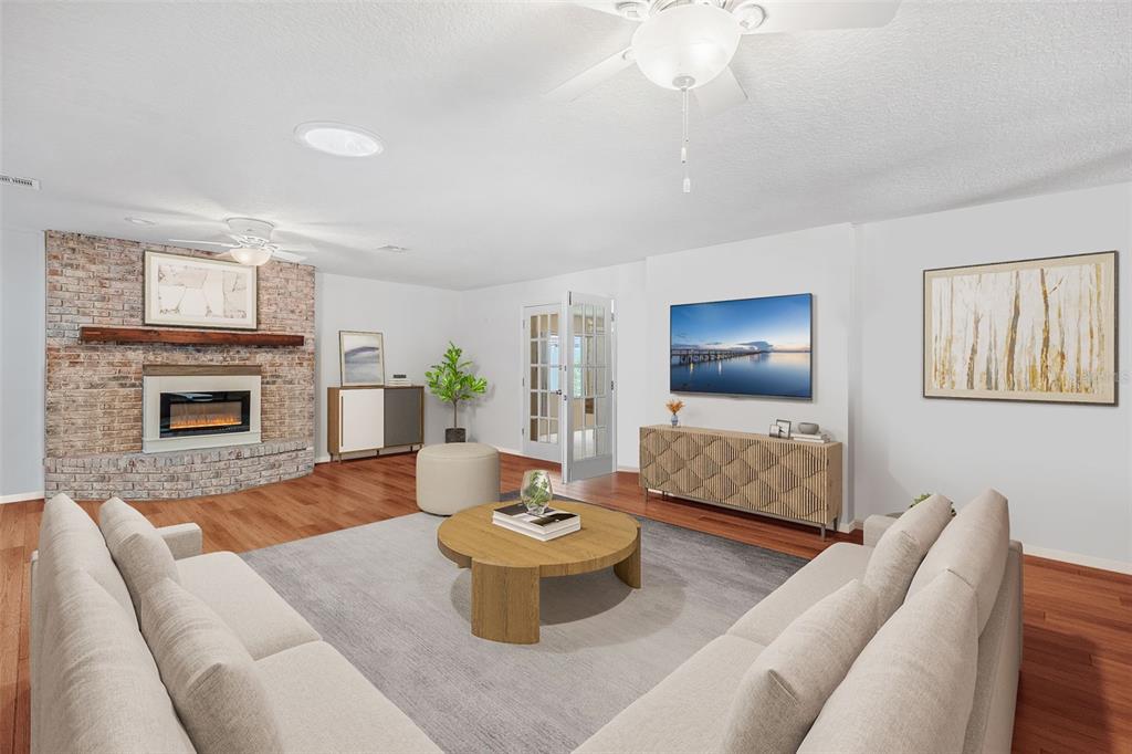 1702 Elaine Avenue Altamonte Springs, FL 32701 - Photo 11 of 39 a living room with furniture and a fireplace