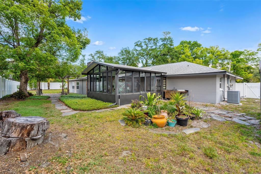 1702 Elaine Avenue Altamonte Springs, FL 32701 - Photo 33 of 39 a view of a house with a yard and a garden