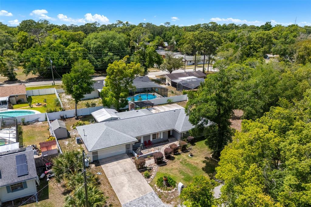 1702 Elaine Avenue Altamonte Springs, FL 32701 - Photo 38 of 39 an aerial view of a house with swimming pool and a yard