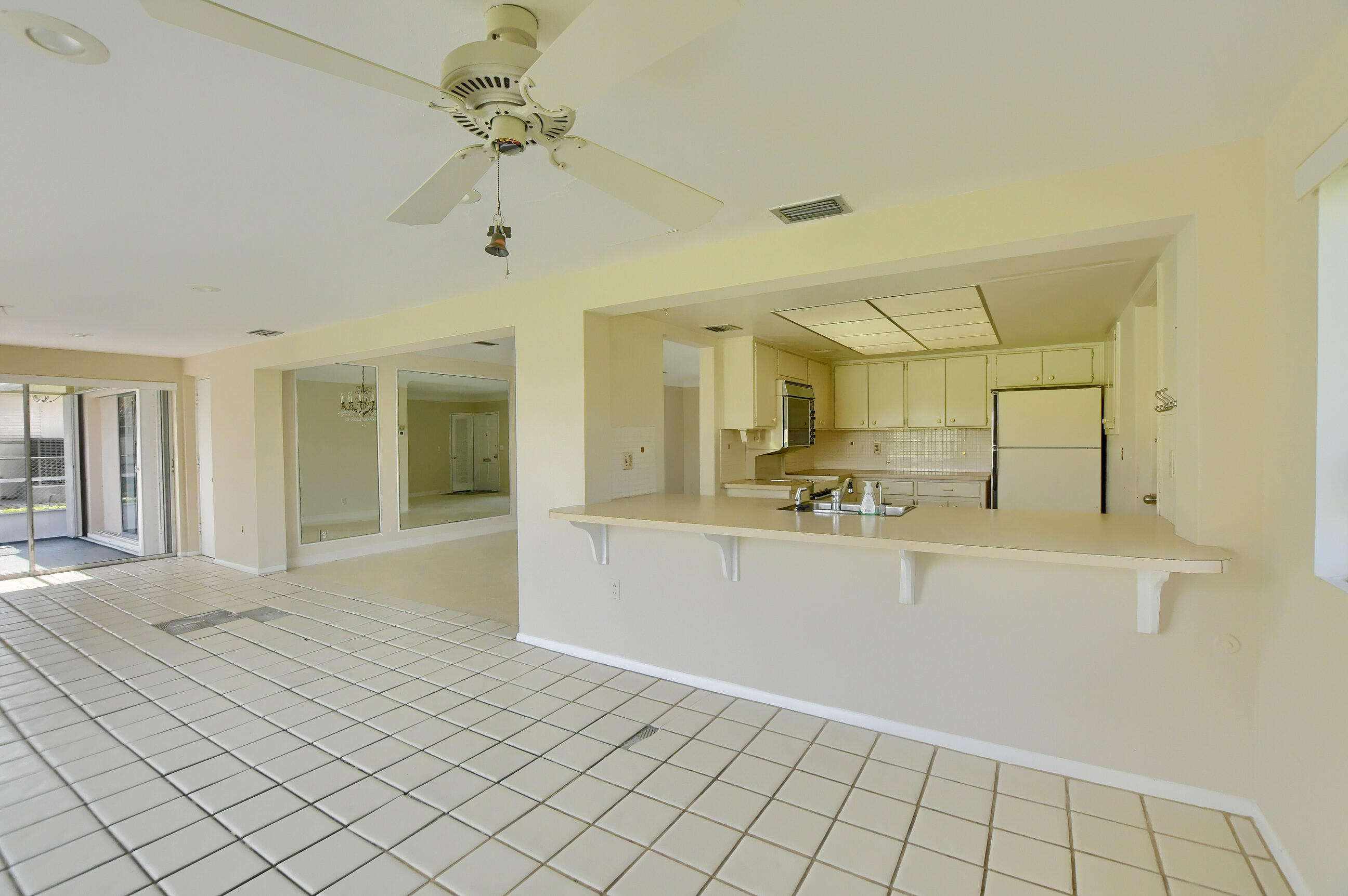 1099 Southwest 13th Place Boca Raton, FL 33486 - Photo 14 of 45 a view of a kitchen with marble kitchen and sink