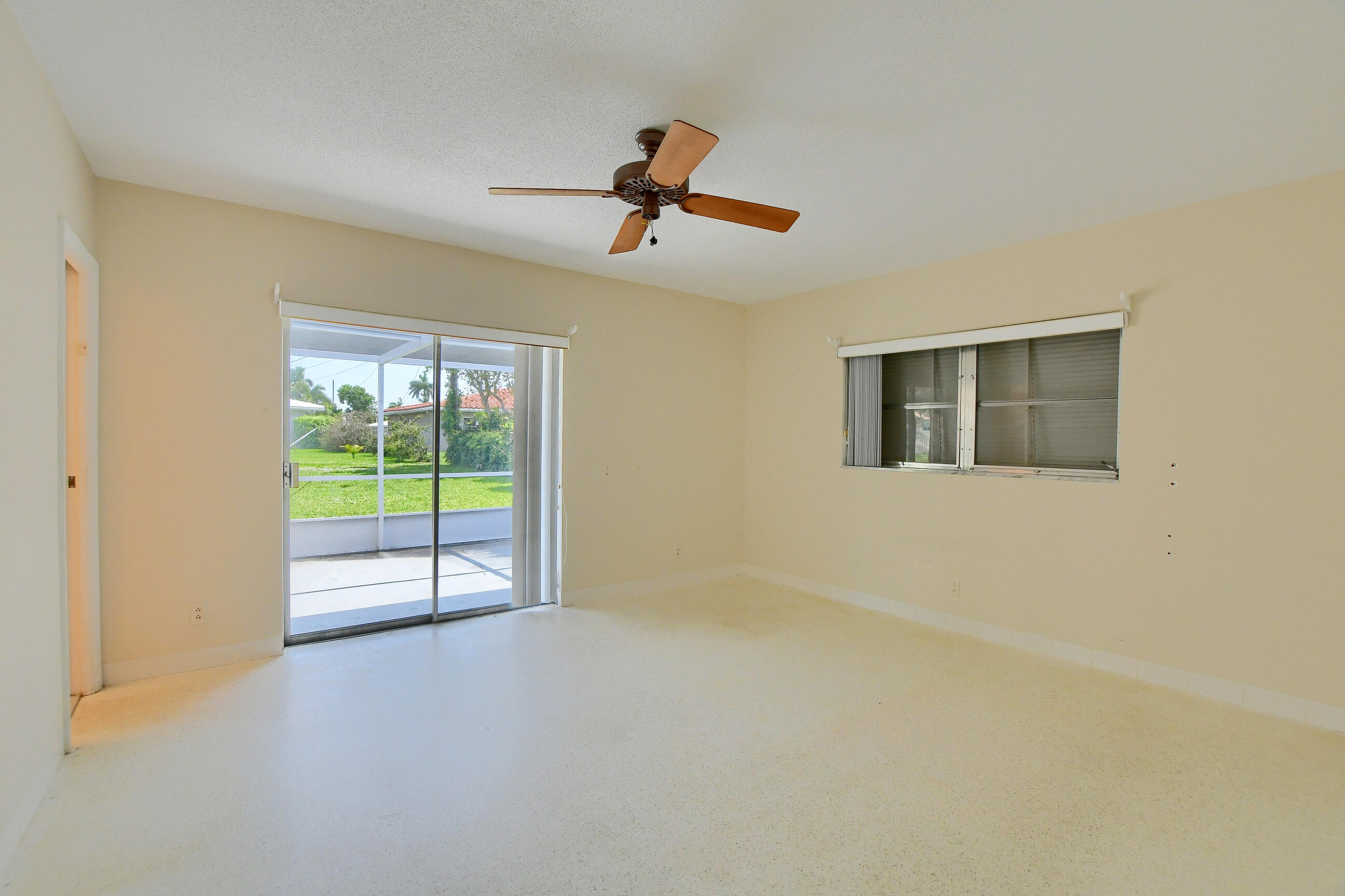 1099 Southwest 13th Place Boca Raton, FL 33486 - Photo 19 of 45 an empty room with windows