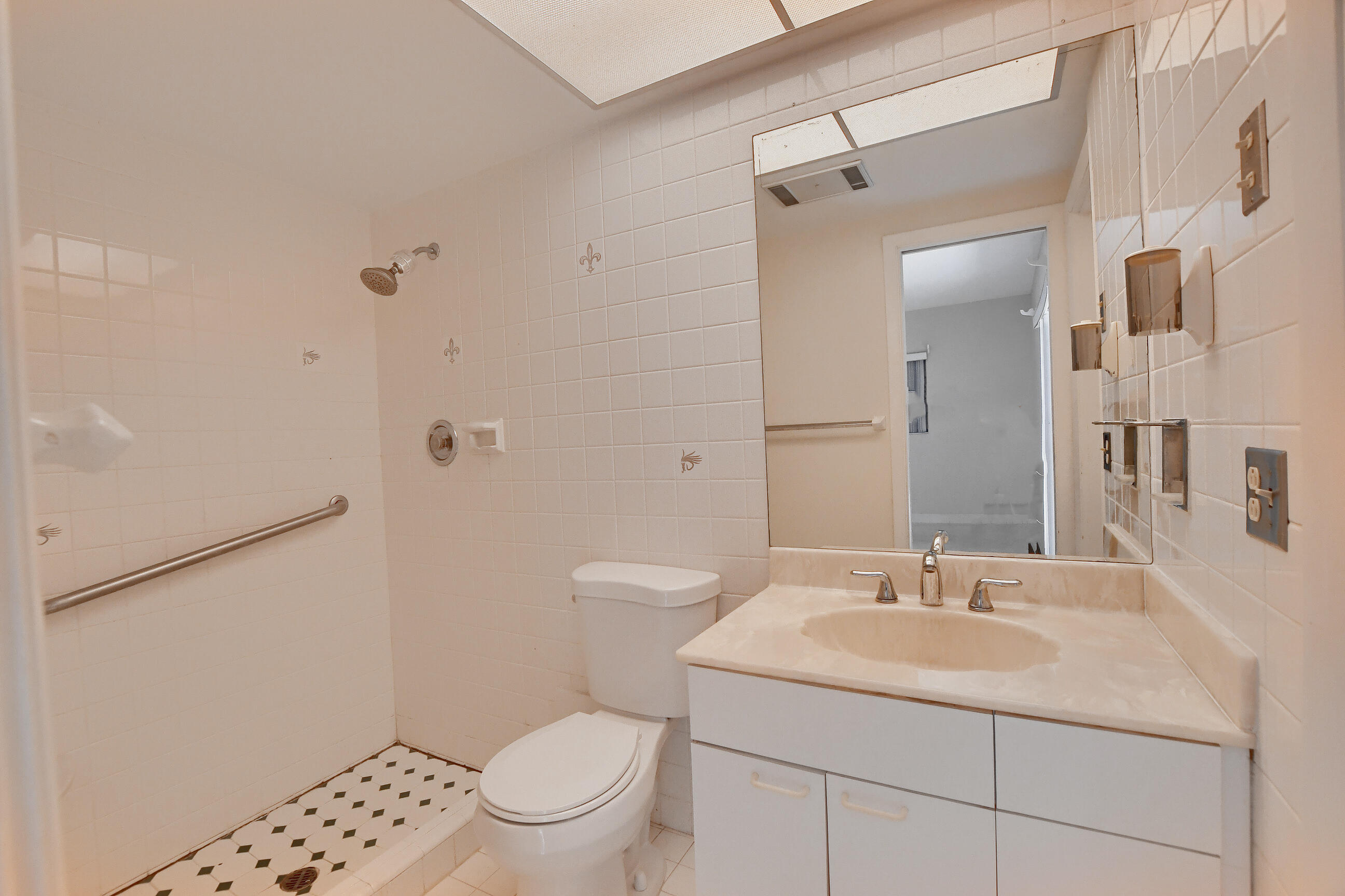 1099 Southwest 13th Place Boca Raton, FL 33486 - Photo 22 of 45 a bathroom with a sink toilet and shower