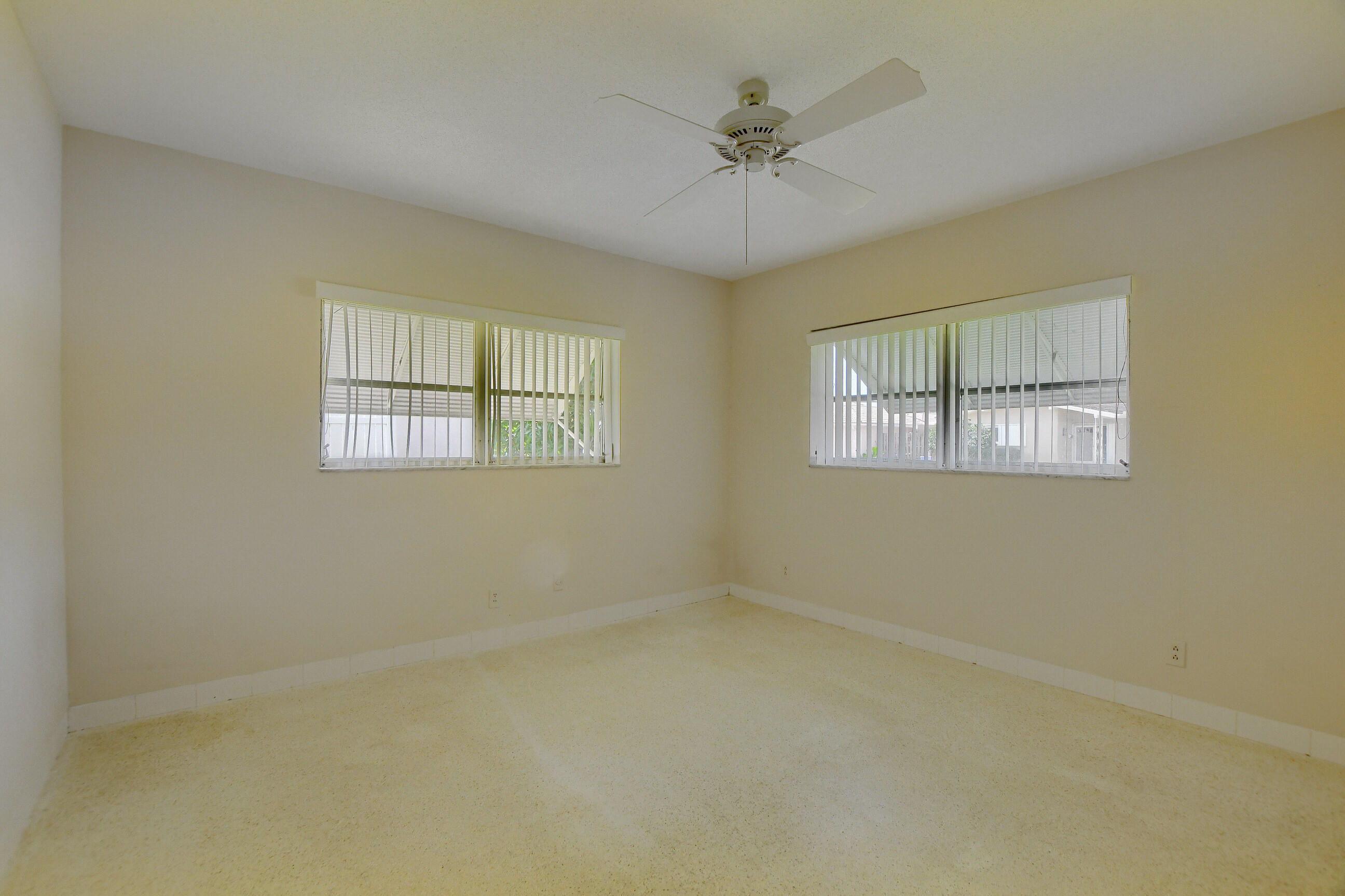1099 Southwest 13th Place Boca Raton, FL 33486 - Photo 23 of 45 a view of an empty room with a window