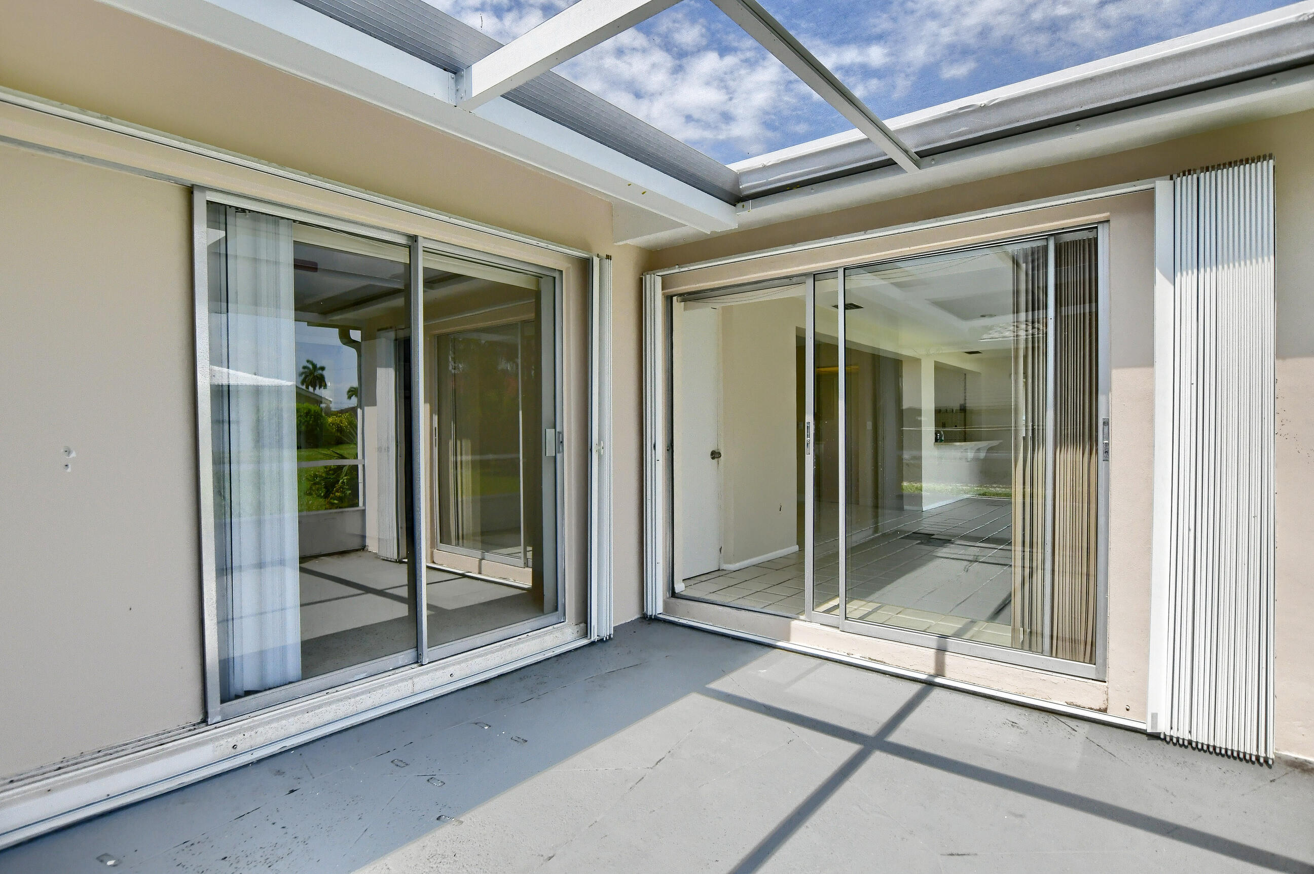 1099 Southwest 13th Place Boca Raton, FL 33486 - Photo 29 of 45 a view of a entryway door