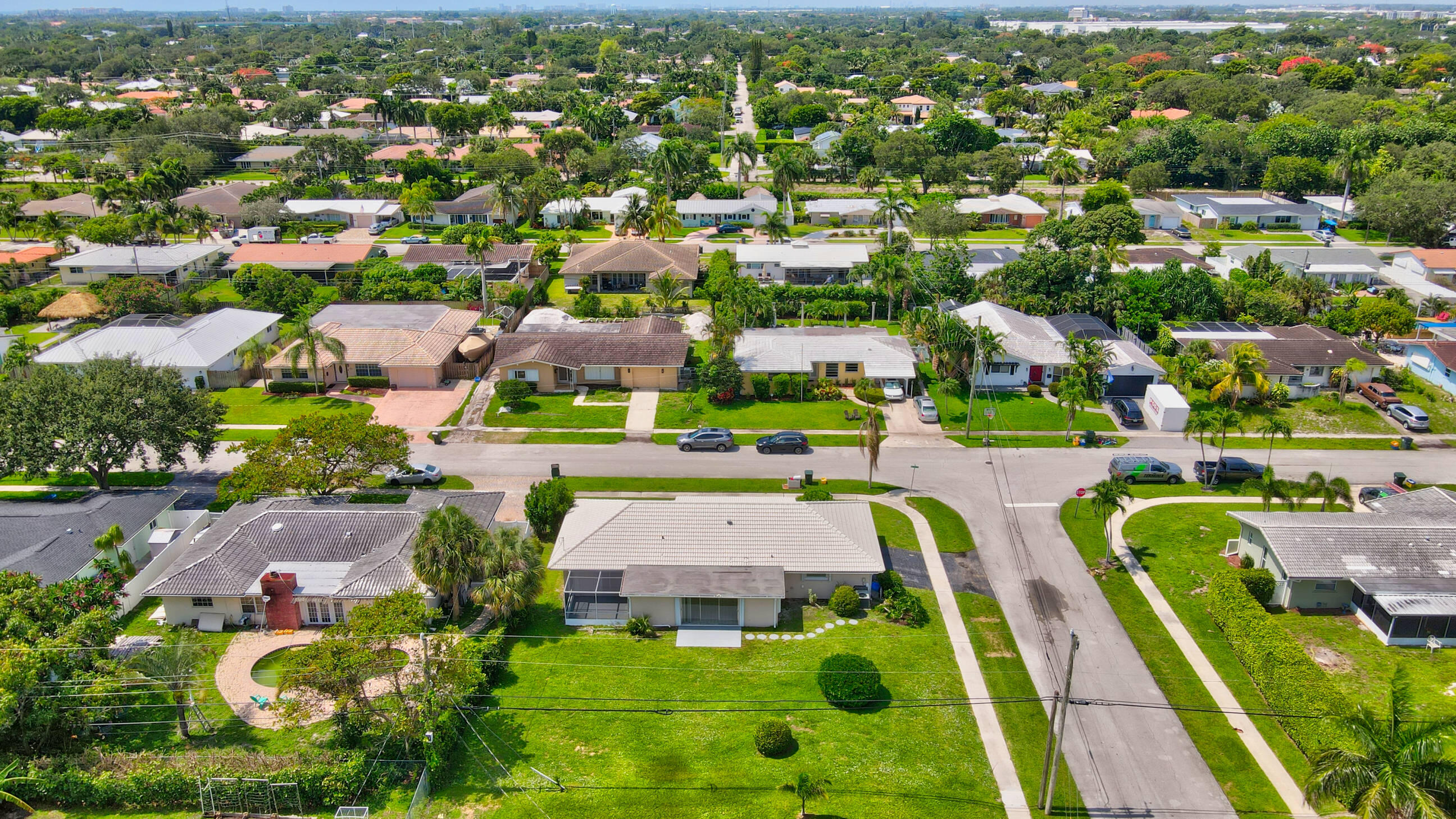 1099 Southwest 13th Place Boca Raton, FL 33486 - Photo 40 of 45 an aerial view of swimming pool patio and mountain view