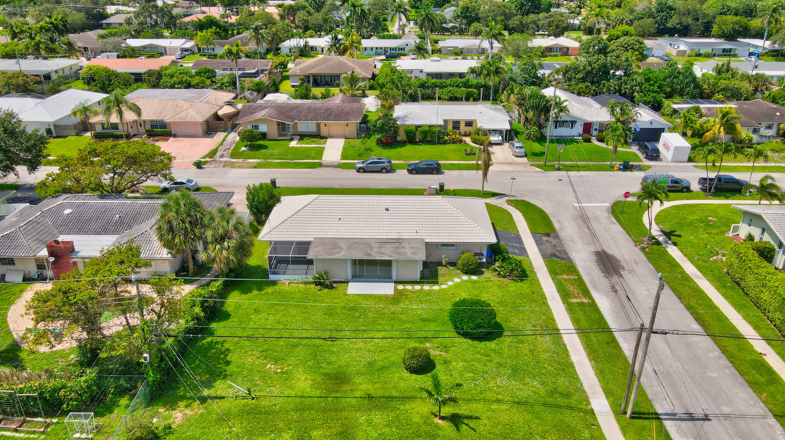 1099 Southwest 13th Place Boca Raton, FL 33486 - Photo 41 of 45 an aerial view of residential houses with outdoor space