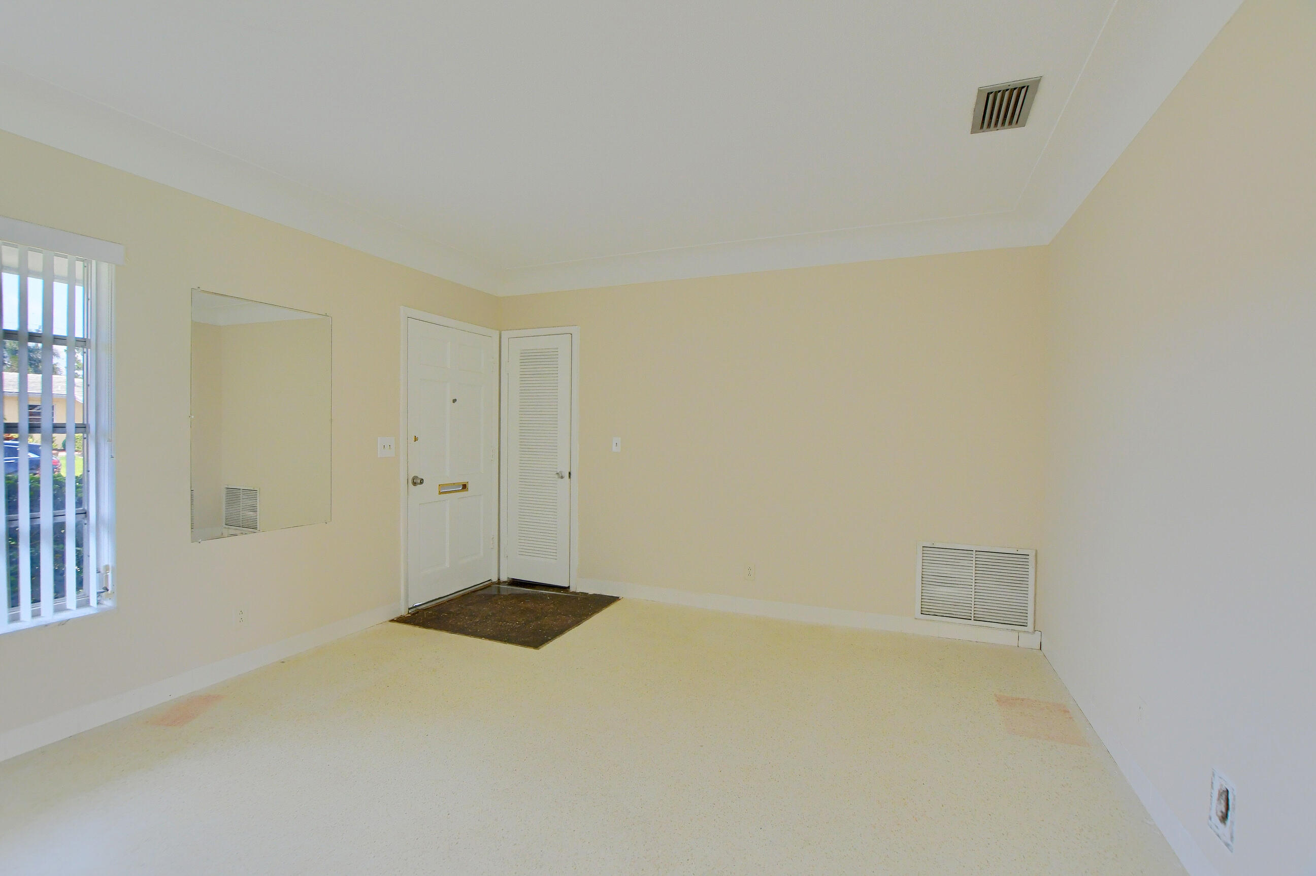 1099 Southwest 13th Place Boca Raton, FL 33486 - Photo 7 of 45 a view of an empty room