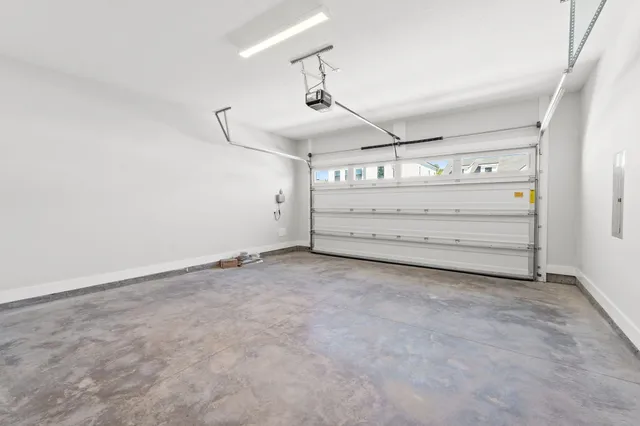 a view of a room with cabinet and windows