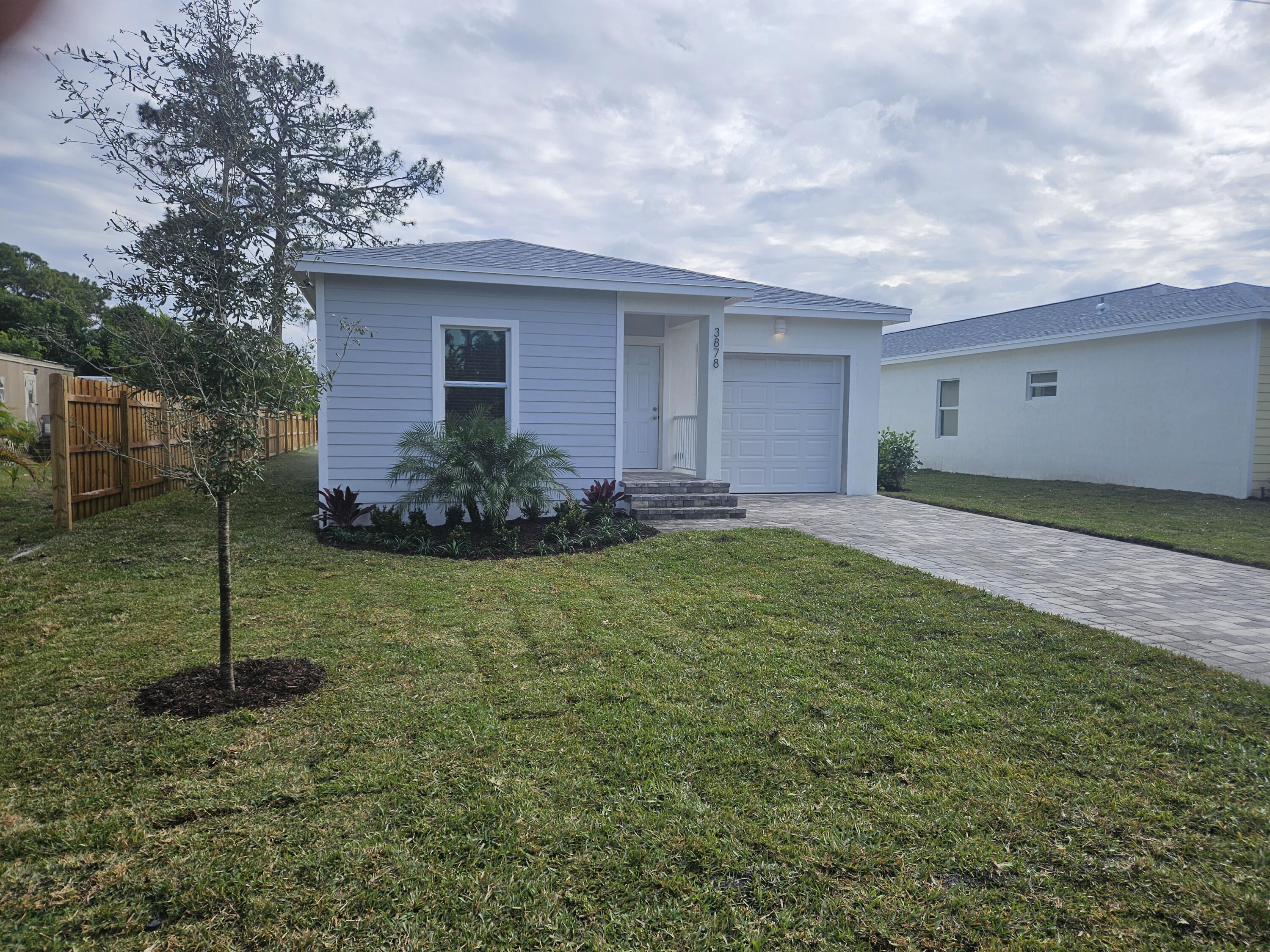 3848 Southeast Grant Street Stuart, FL 34997 - Photo 2 of 39 20260130_143144