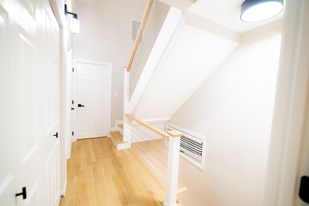 2 Turning Mill Lane, Unit 1 Quincy, MA 02169 - Photo 9 of 15 a view of walk in closet with empty racks