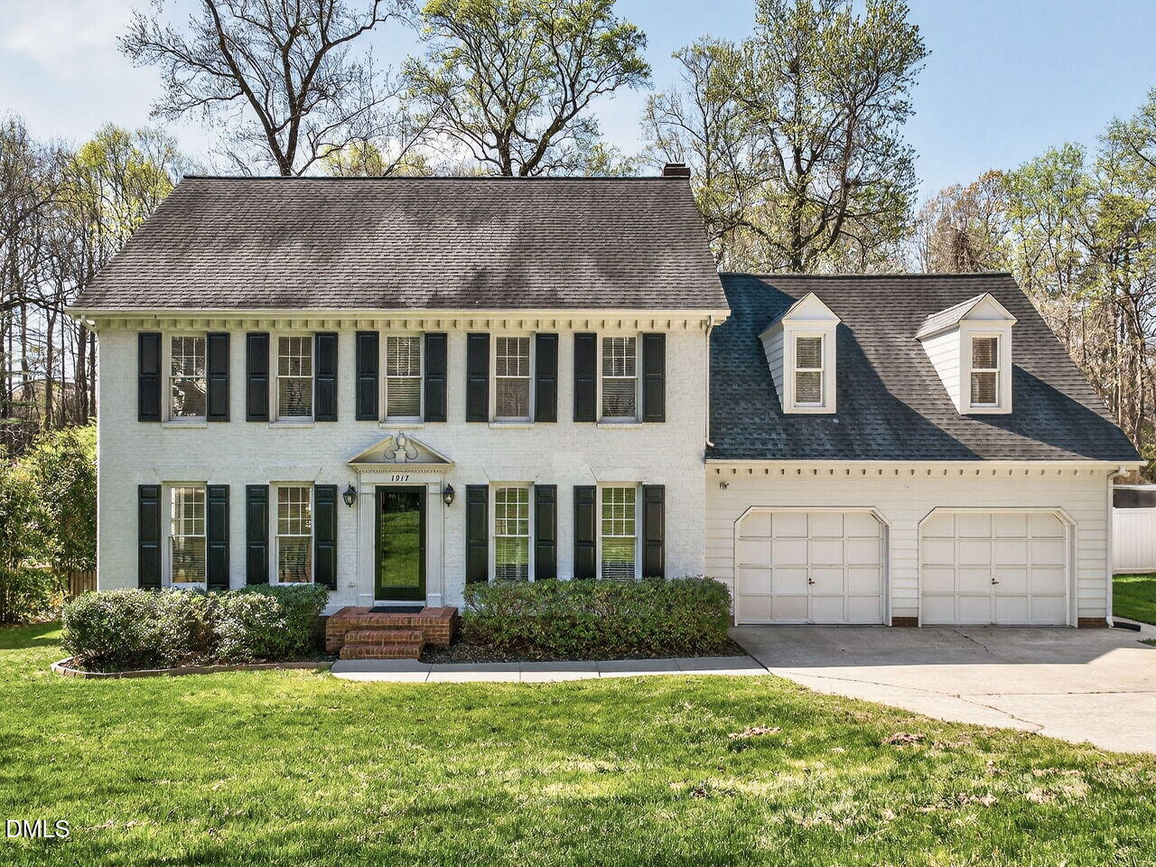 1917 Hamrick Drive Raleigh, NC 27615 - Photo 1 of 23 front view of a house with a yard