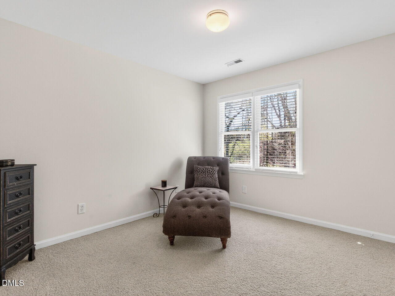 1917 Hamrick Drive Raleigh, NC 27615 - Photo 16 of 23 an empty room with windows