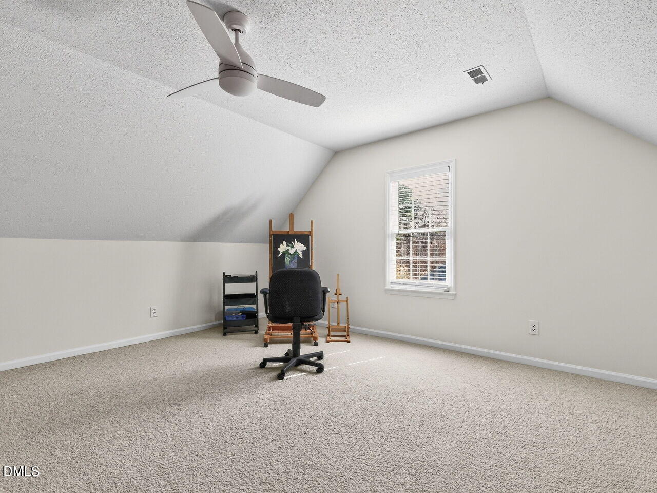 1917 Hamrick Drive Raleigh, NC 27615 - Photo 17 of 23 a view of a room with gym equipment