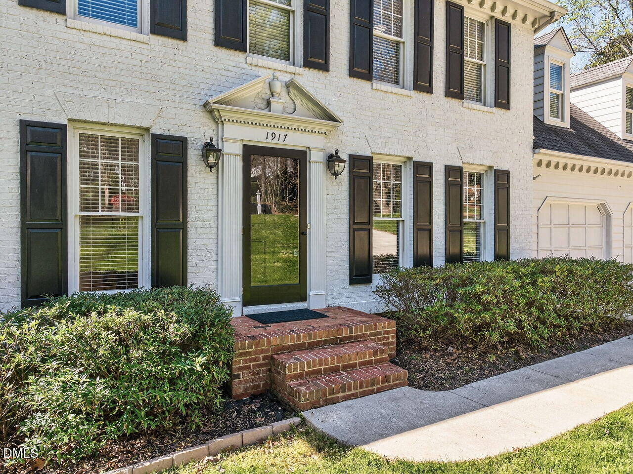 1917 Hamrick Drive Raleigh, NC 27615 - Photo 2 of 23 a front view of a house
