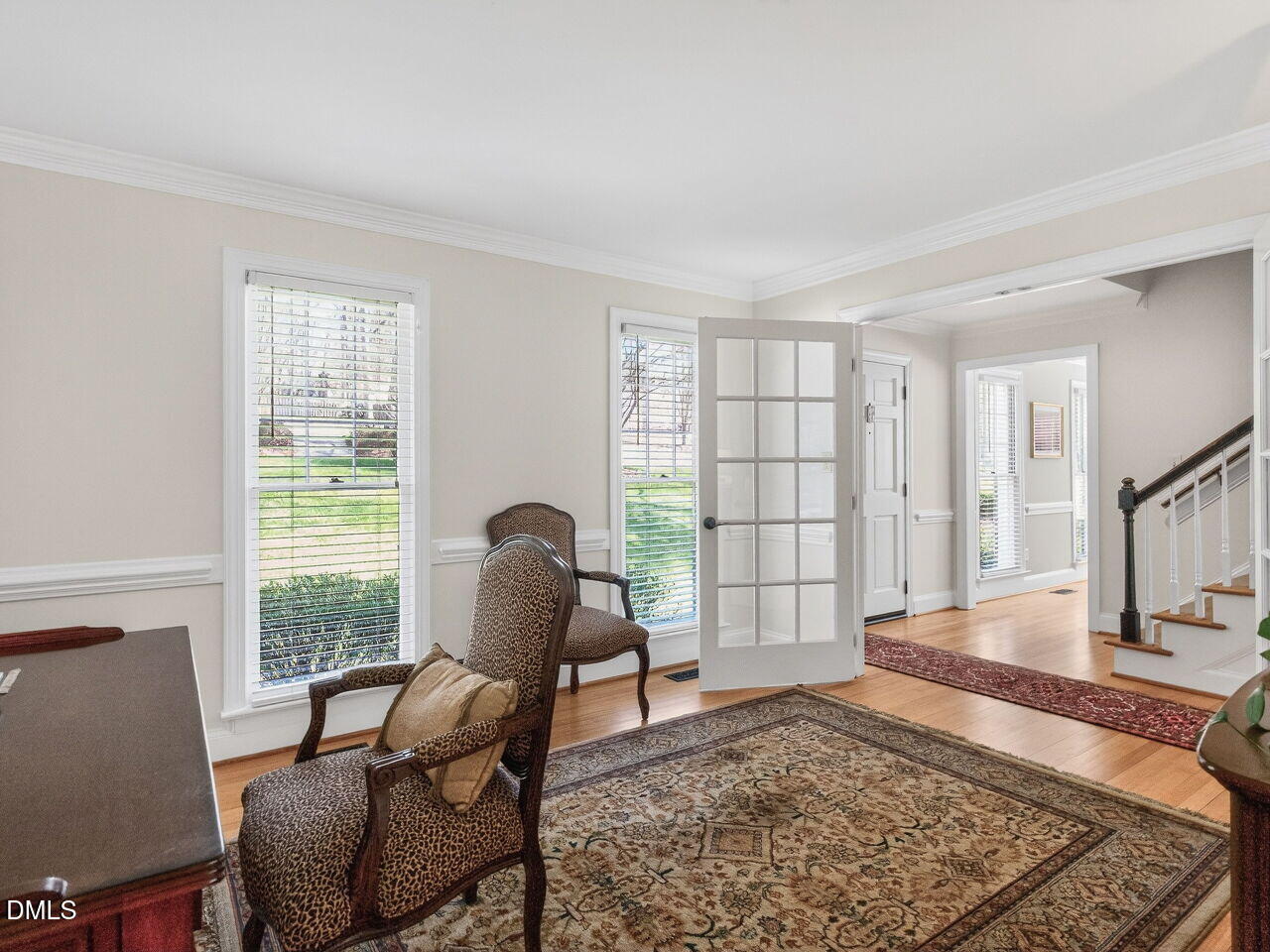 1917 Hamrick Drive Raleigh, NC 27615 - Photo 8 of 23 a living room with furniture rug and window