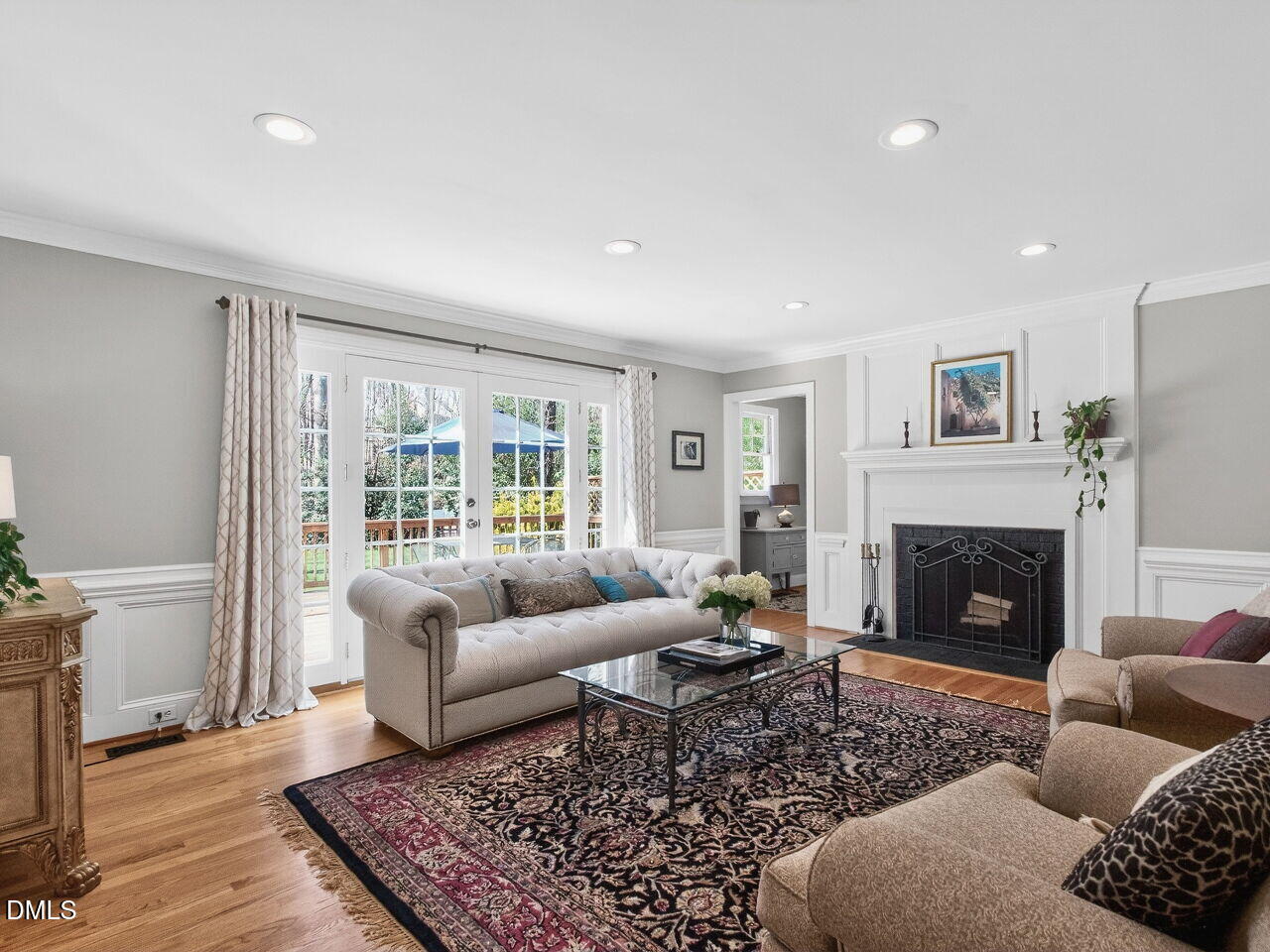 1917 Hamrick Drive Raleigh, NC 27615 - Photo 10 of 23 a living room with furniture and a fireplace