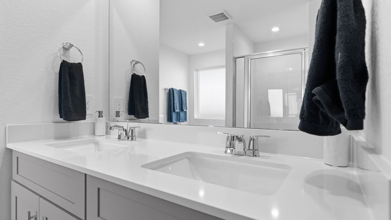 3229 Bolt Rope Drive Texas City, TX 77510 - Photo 11 of 20 a bathroom with a double vanity sink and a mirror