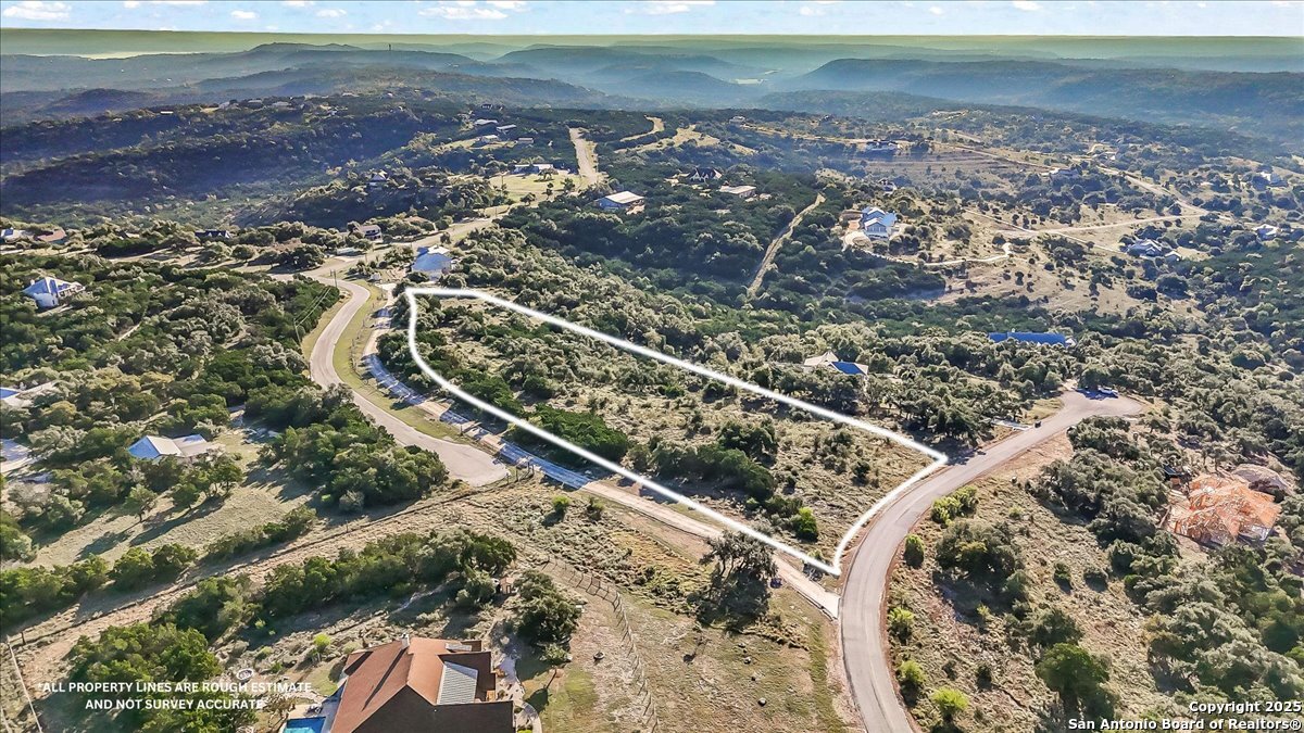 1059 Ranger Ridge New Braunfels, TX 78132 - Photo 4 of 23 a view of a yard with an ocean