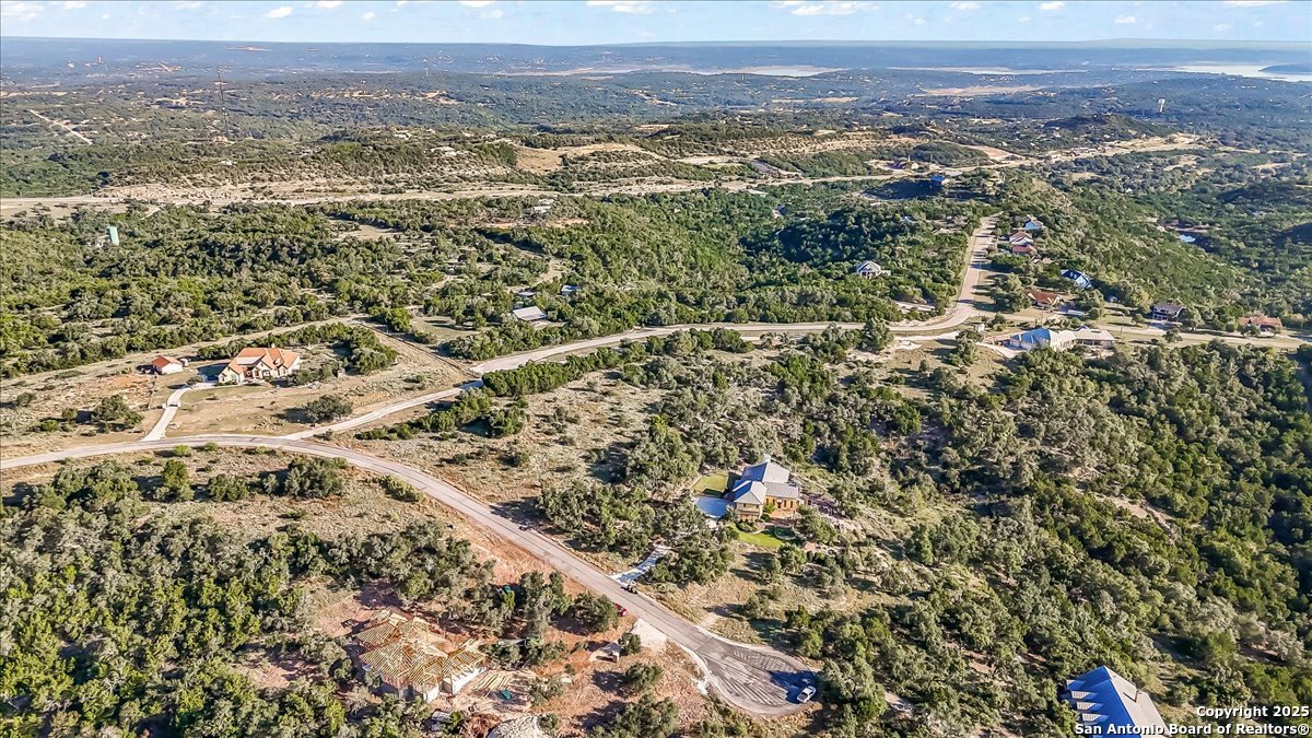 1059 Ranger Ridge New Braunfels, TX 78132 - Photo 6 of 23 an aerial view of house with yard and mountain view in back
