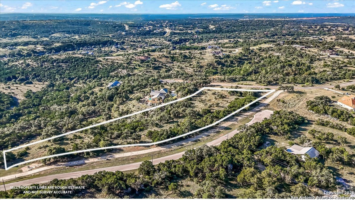 1059 Ranger Ridge New Braunfels, TX 78132 - Photo 9 of 23 an aerial view of a residential houses with outdoor space and street view