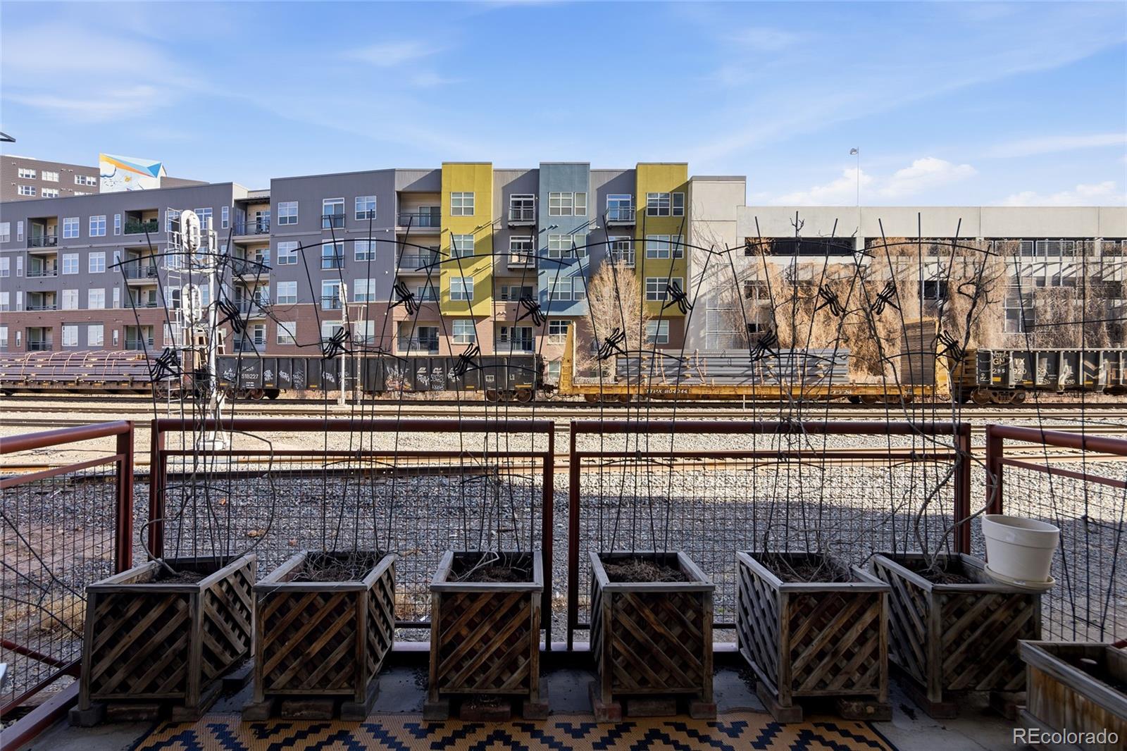 2000 Little Raven Street, Unit 102 Denver, CO 80202 - Photo 17 of 36 a view of a city with tall buildings