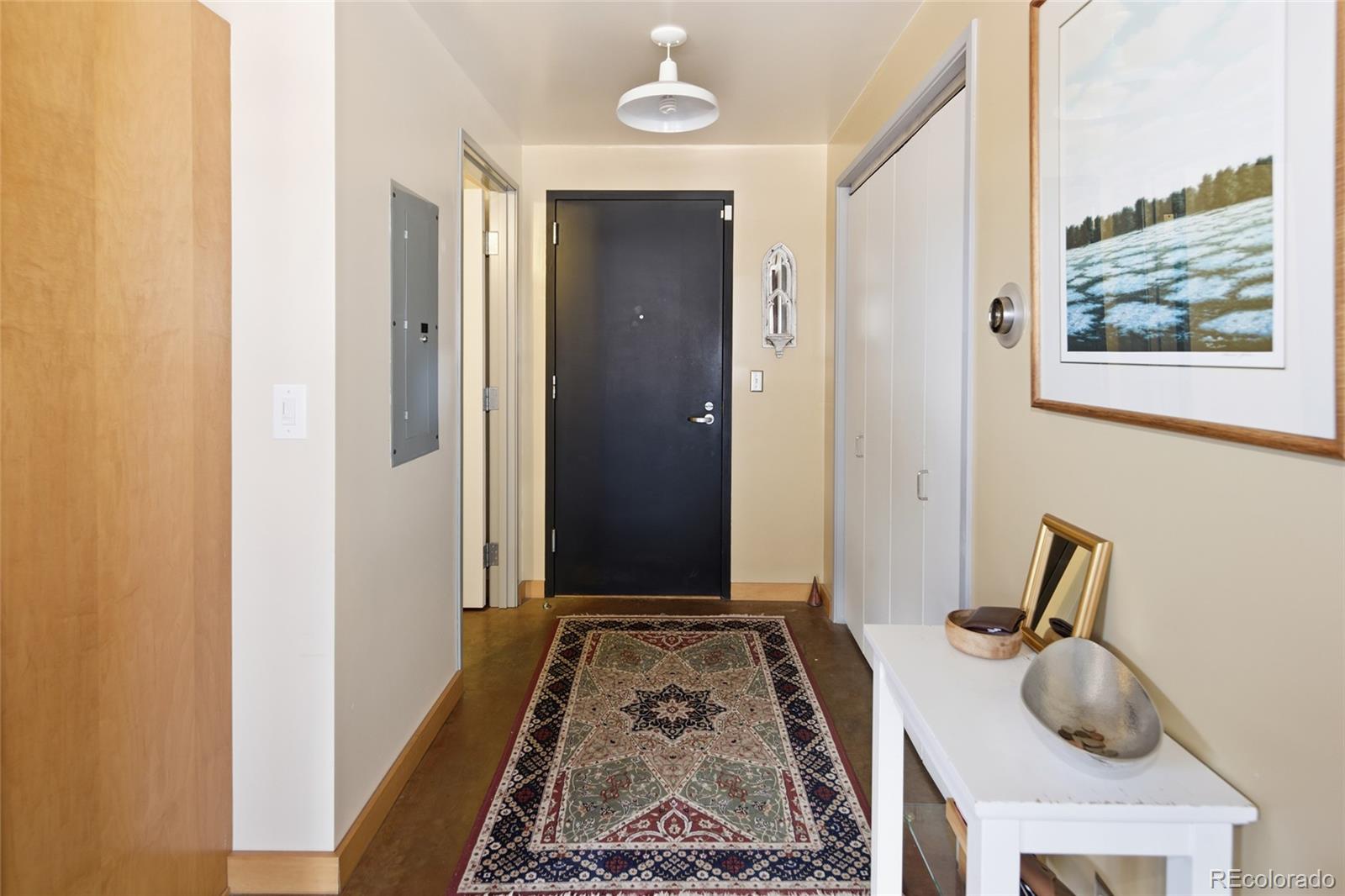 2000 Little Raven Street, Unit 102 Denver, CO 80202 - Photo 21 of 36 a bathroom with a sink and a mirror