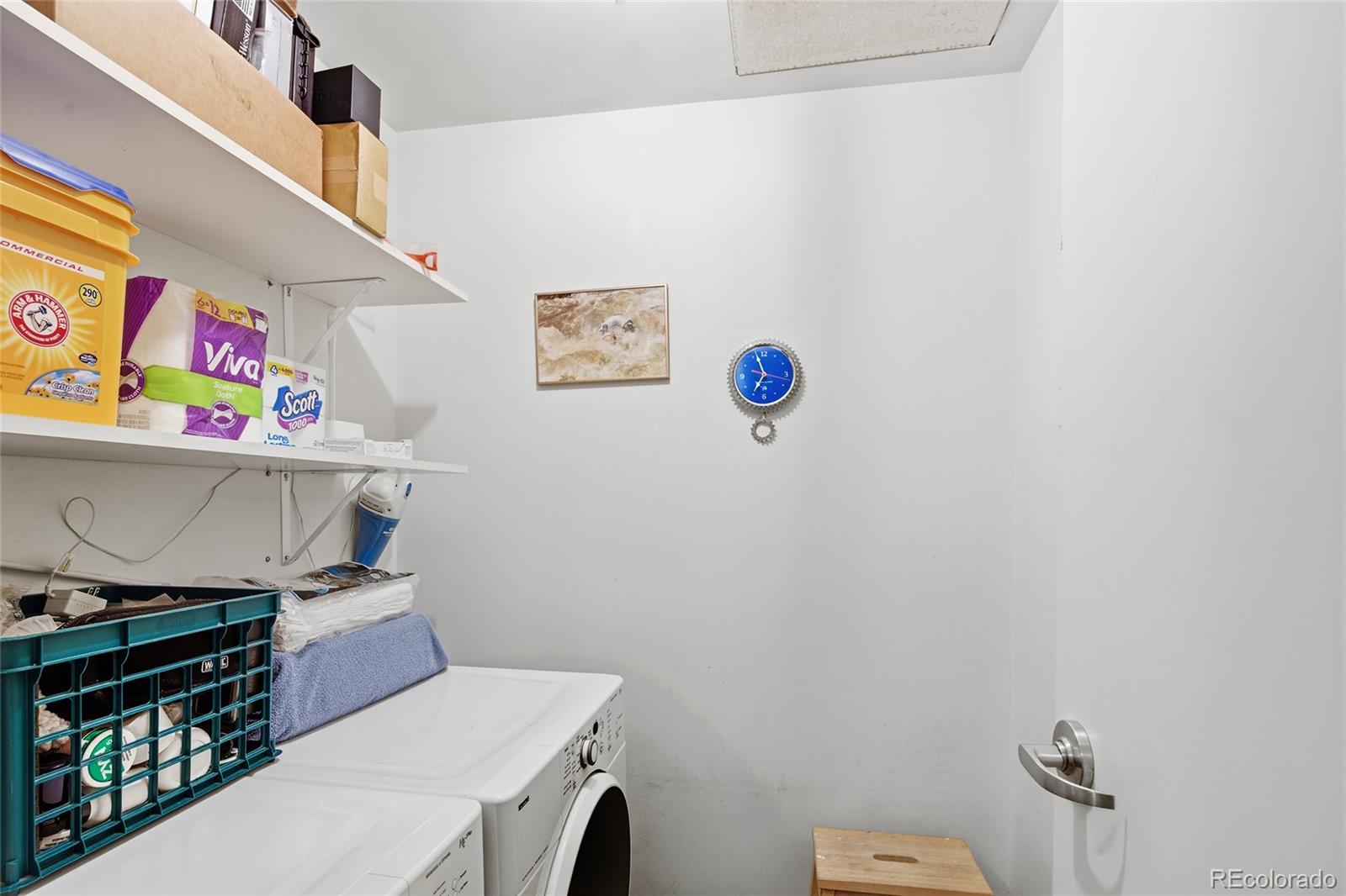 2000 Little Raven Street, Unit 102 Denver, CO 80202 - Photo 22 of 36 a utility room with dryer and washer