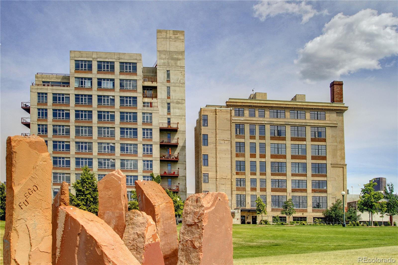 2000 Little Raven Street, Unit 102 Denver, CO 80202 - Photo 29 of 36 a front view of a building with a garden