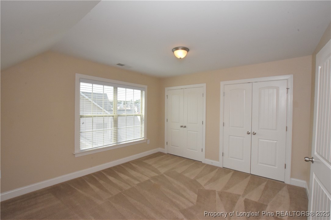 94 Revolutionary Road Cameron, NC 28326 - Photo 21 of 31 a view of an empty room with a window