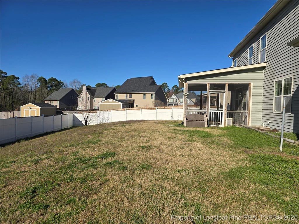 94 Revolutionary Road Cameron, NC 28326 - Photo 29 of 31 a view of a house with backyard and porch