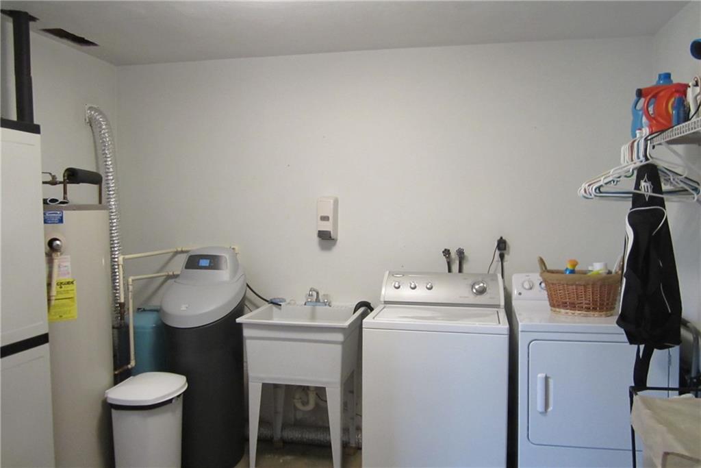 158 Craft Washington, PA 15301 - Photo 20 of 25 Laundry room, lower level. Water softener is included with sale as are the washer and dryer.