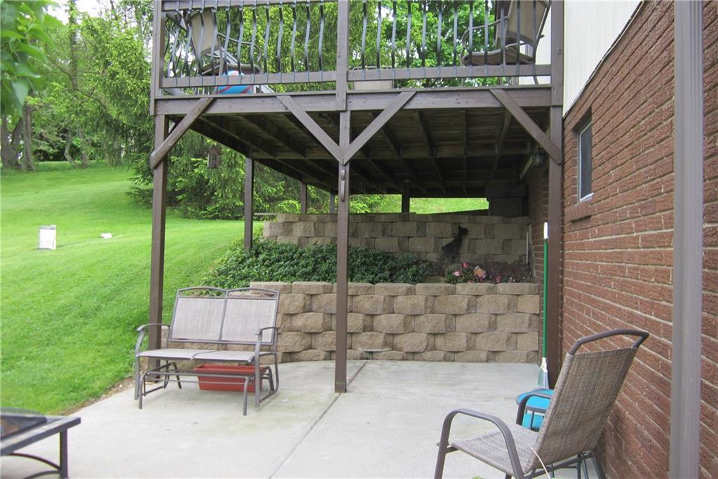 158 Craft Washington, PA 15301 - Photo 21 of 25 Patio for relaxing on a summer day. To the right is entrance to lower level.