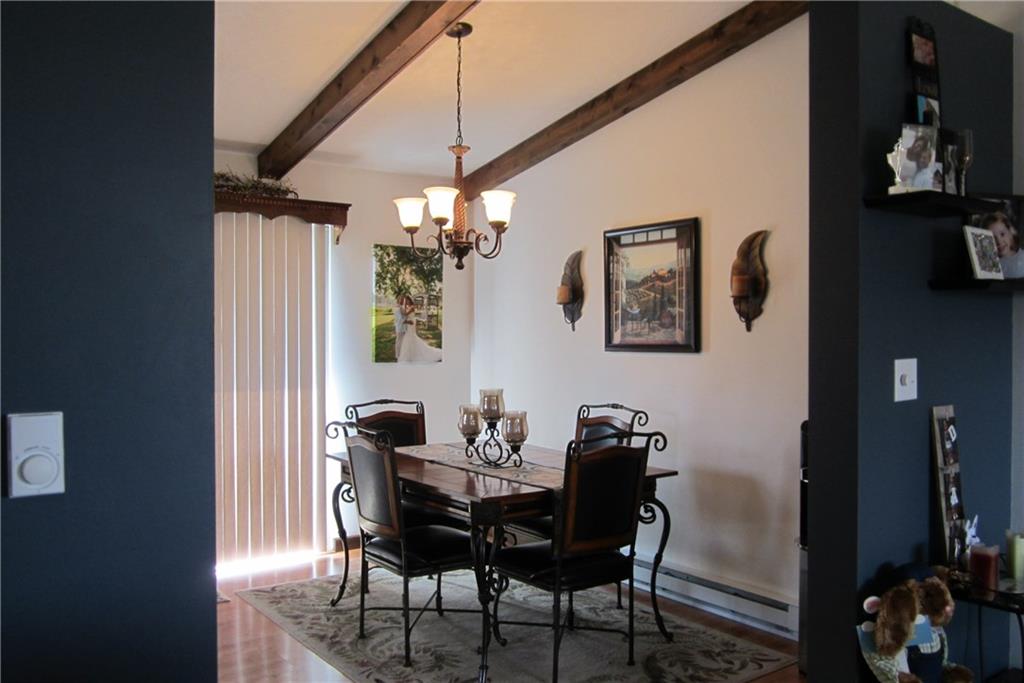 158 Craft Washington, PA 15301 - Photo 5 of 25 Dining and kitchen area has laminate flooring. Patio doors provide access to rear deck.