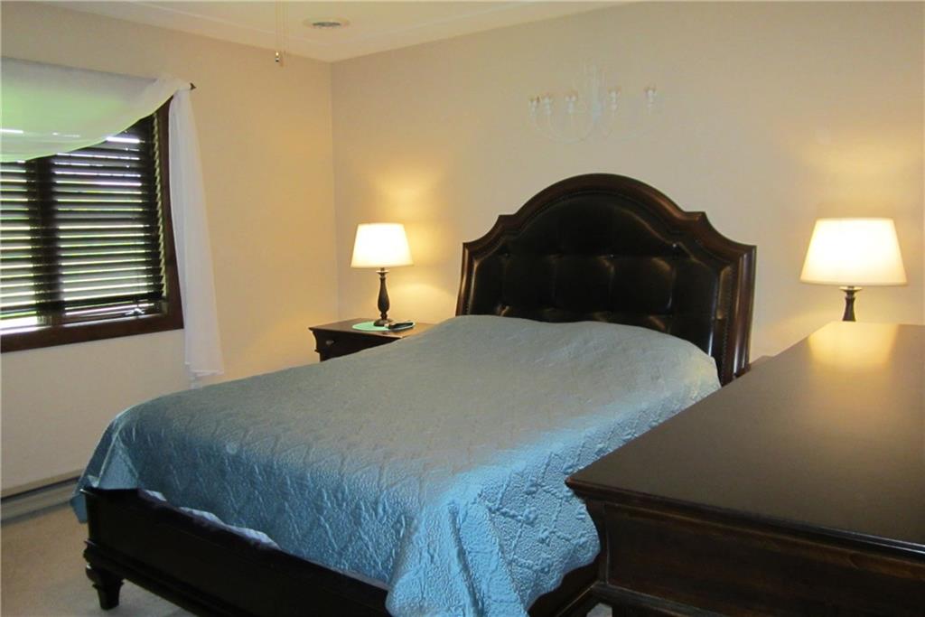 158 Craft Washington, PA 15301 - Photo 9 of 25 Master bedroom, neutral carpeting. Note each room has electric baseboard heating with its own thermostat.