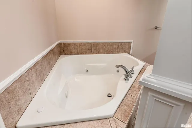 a bathroom with a bathtub