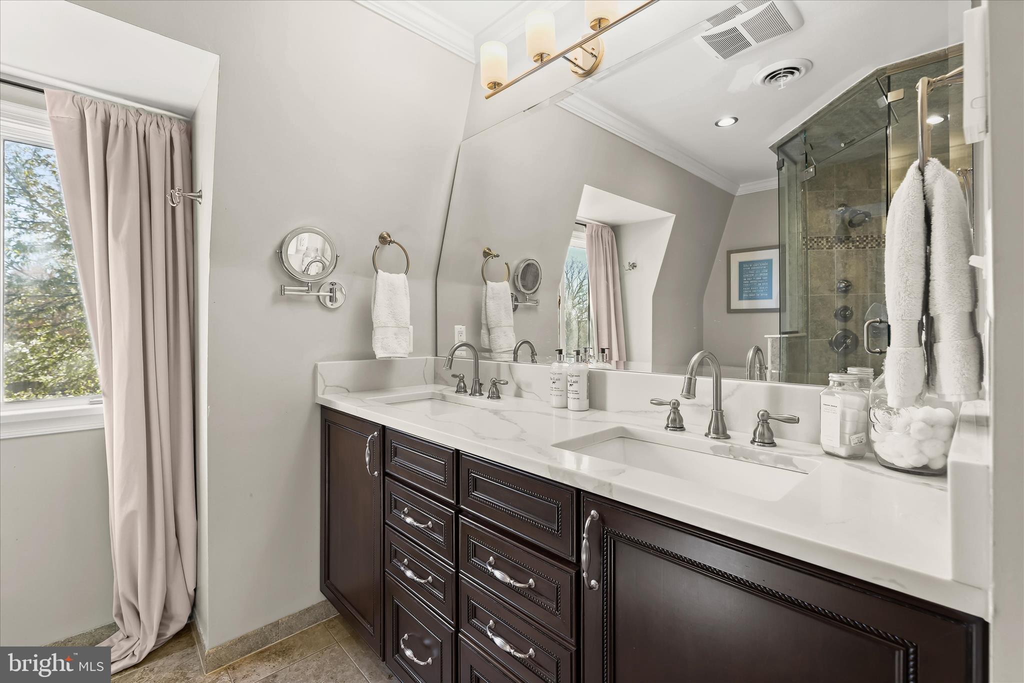 2102 Highland Ridge Drive Phoenix, MD 21131 - Photo 45 of 95 a bathroom with a double vanity sink mirror and double