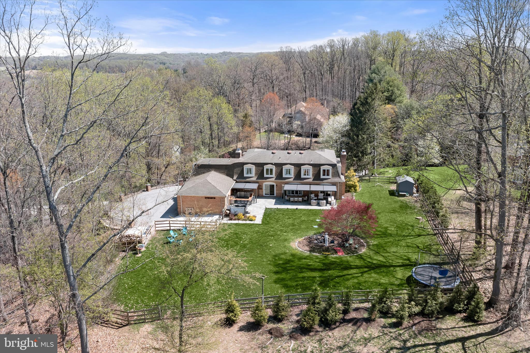2102 Highland Ridge Drive Phoenix, MD 21131 - Photo 69 of 95 a view of a house with a yard and a large tree