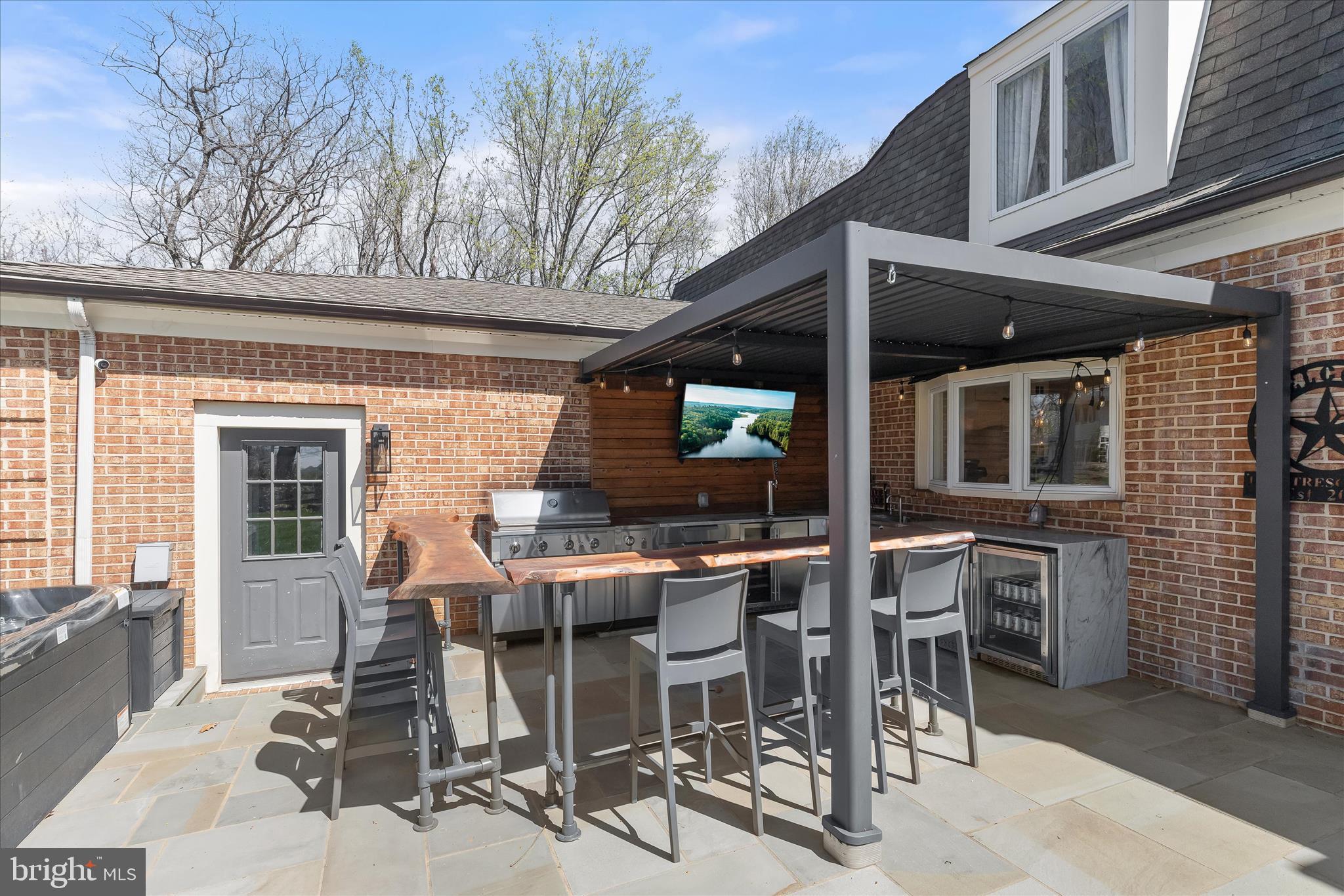 2102 Highland Ridge Drive Phoenix, MD 21131 - Photo 73 of 95 a view of a patio with a table and chairs and couches