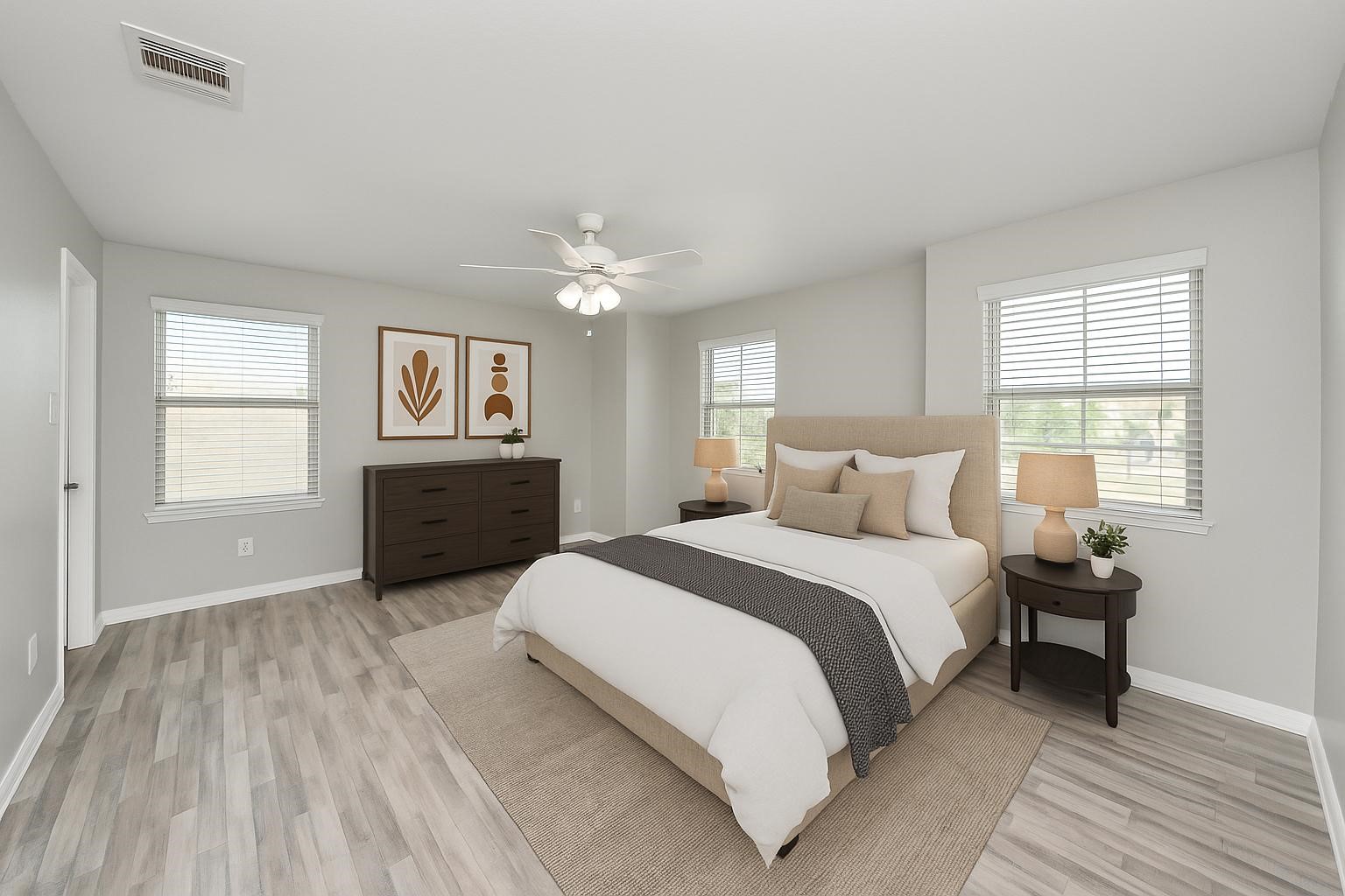 6931 Primrose Road Baytown, TX 77521 - Photo 37 of 50 a spacious bedroom with a bed and a table