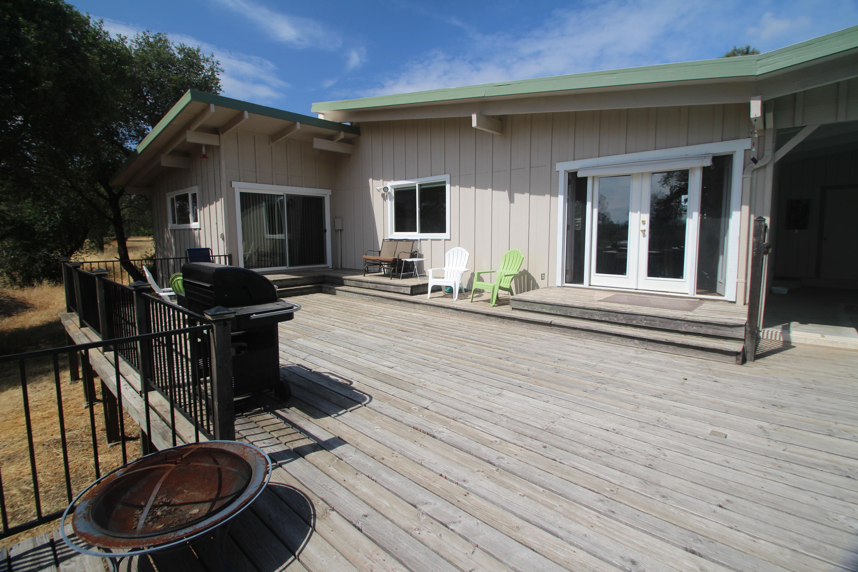 9085 Stillwater Road Redding, CA 96002 - Photo 18 of 23 Deck to Living & Master