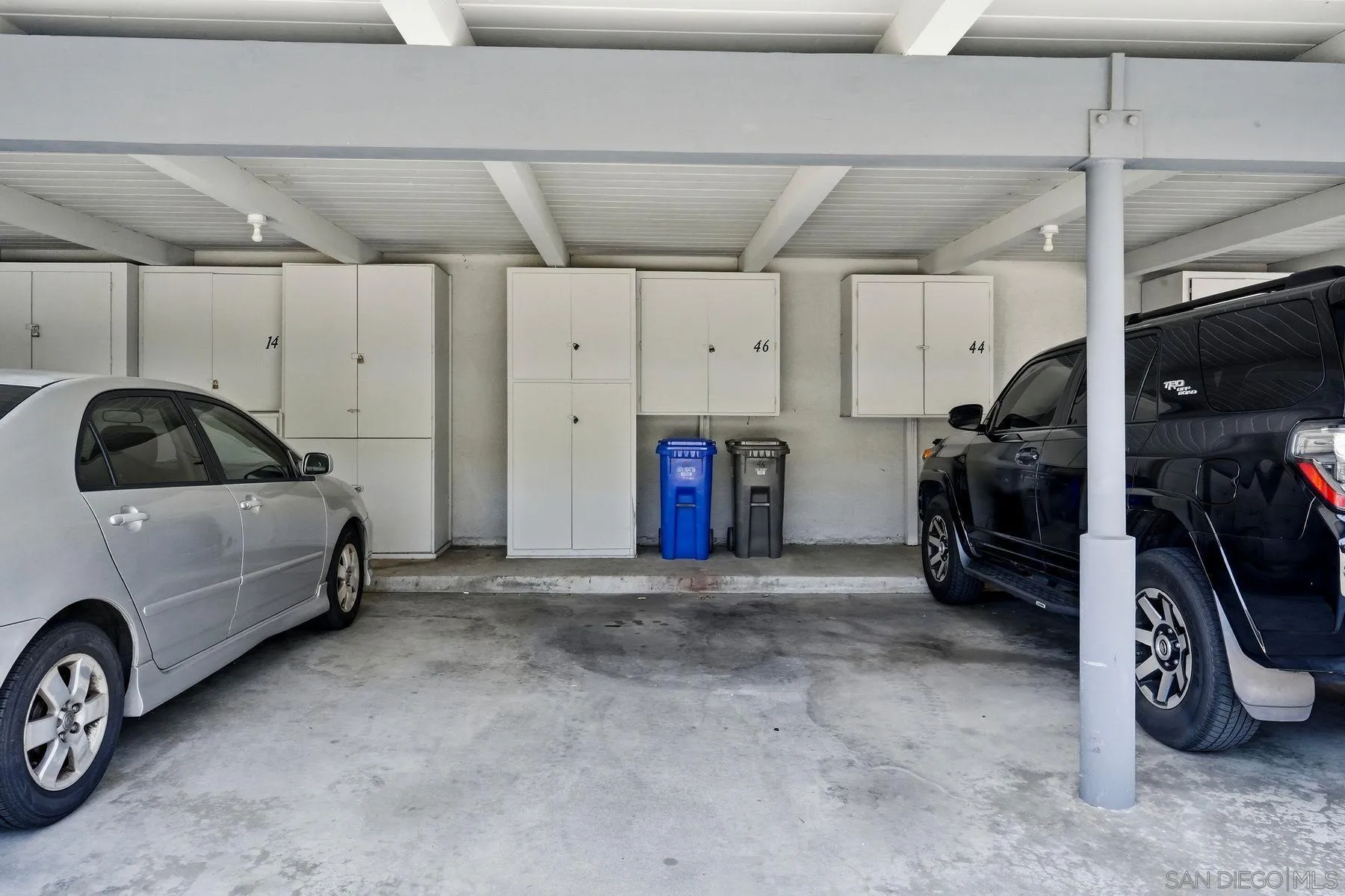 3606 Vista Rey, Unit 46 Oceanside, CA 92057 - Photo 25 of 36 a car is parked in a garage