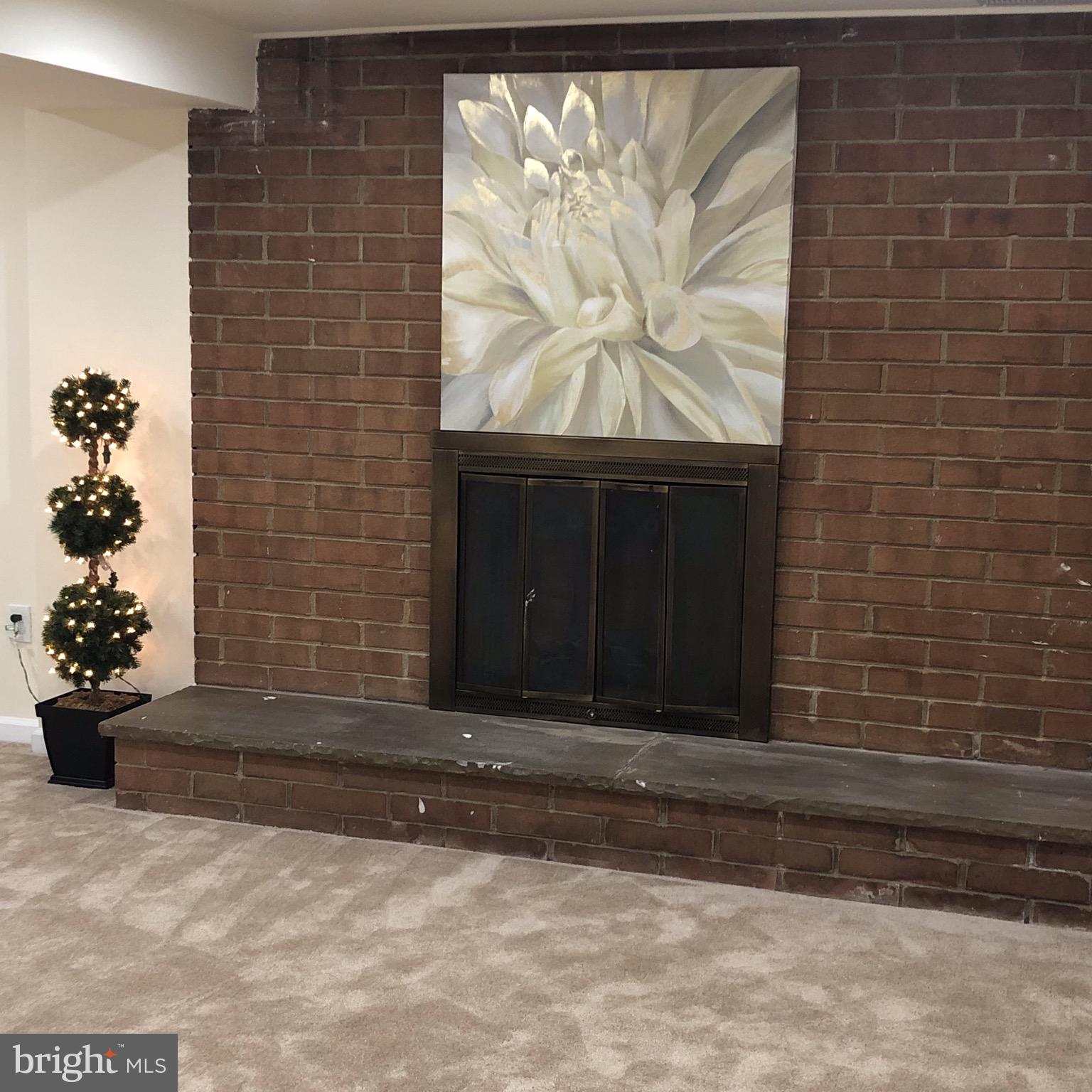 9009 Good Luck Road Lanham, MD 20706 - Photo 44 of 74 Basement Fire Place