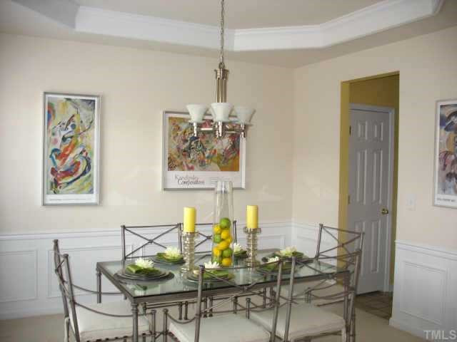 7420 Silver View Lane Raleigh, NC 27613 - Photo 2 of 10 Holiday dinners are a must in the formal dining room. Elegant touches including a trey ceiling and extensive moldings! Other