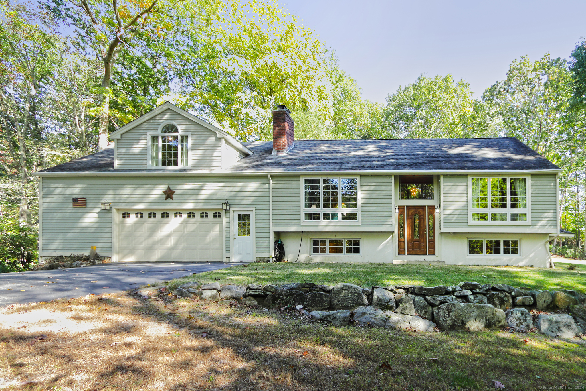 7 Hemlock Hill Road Clinton, CT 06413 - Photo 1 of 1 Expanded raised ranch with 4 bedrooms, 3 bathrooms, primary bedroom suite and lots of space that is bright and welcoming.