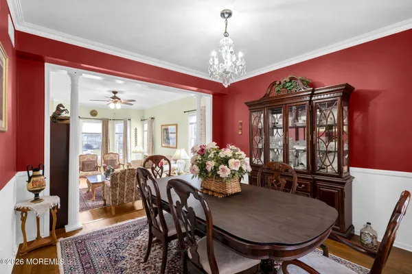 a view of a dining room with furniture window and outside view