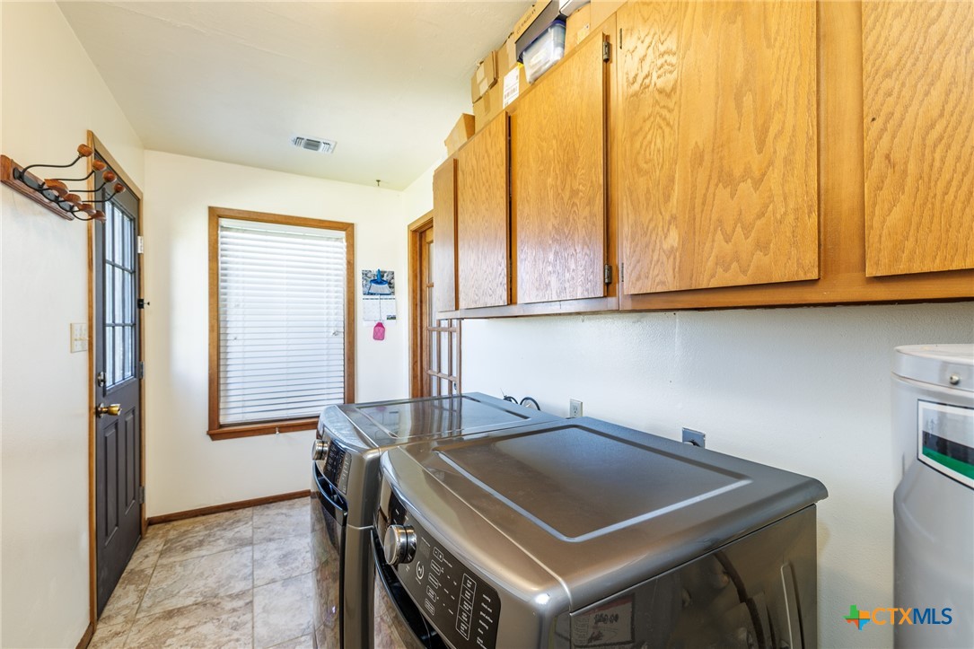 2110 Immenhauser Road Yoakum, TX 77995 - Photo 26 of 39 a room with storage and utility