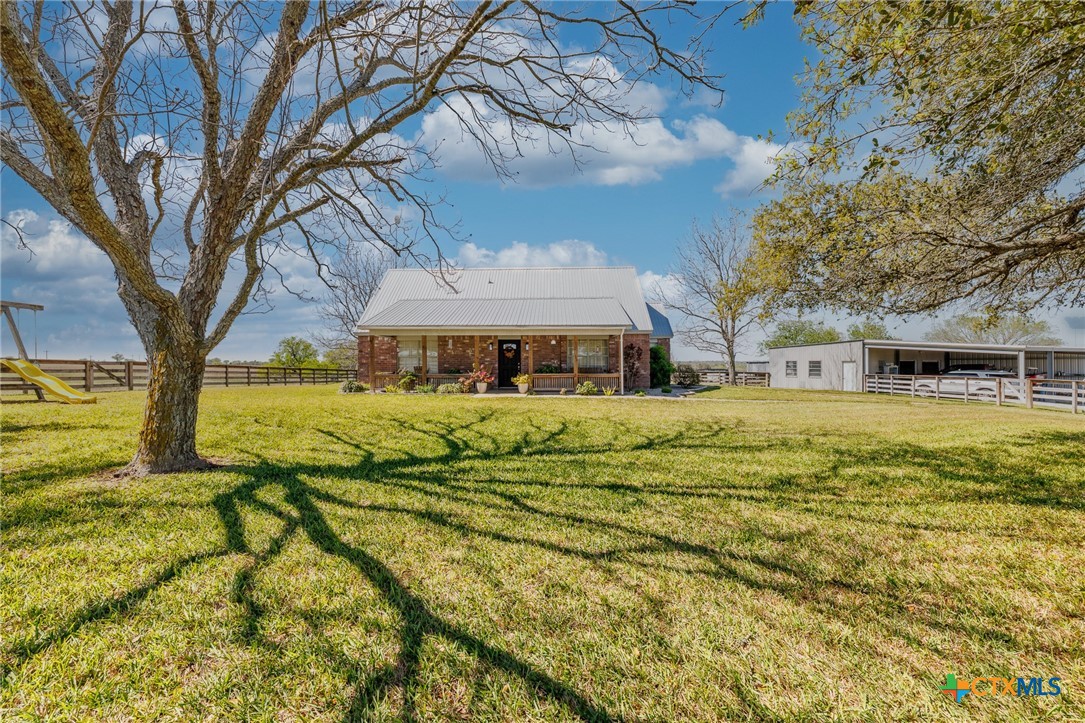 2110 Immenhauser Road Yoakum, TX 77995 - Photo 3 of 39 a front view of house with yard
