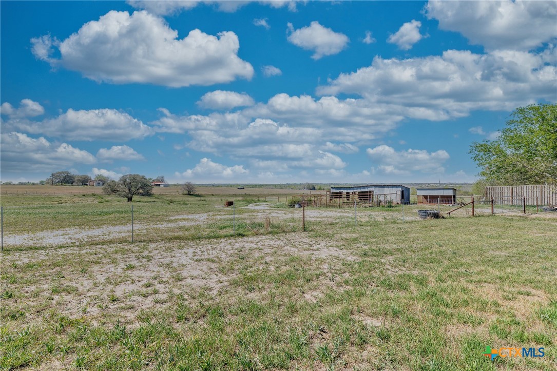 2110 Immenhauser Road Yoakum, TX 77995 - Photo 36 of 39 a view of a house with a yard